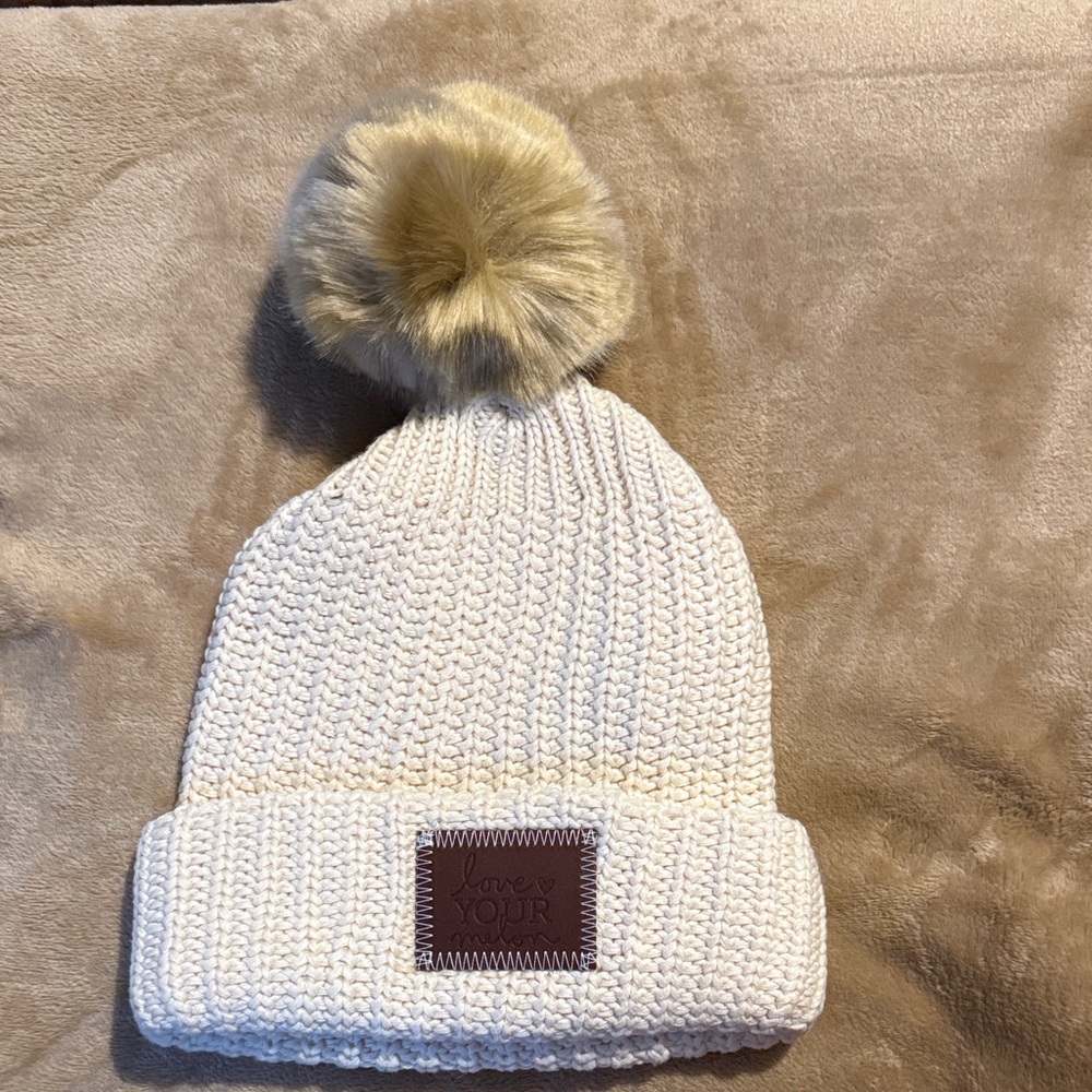 Love Your Melon Cream Knit Beanie with Tan Pom-Pom